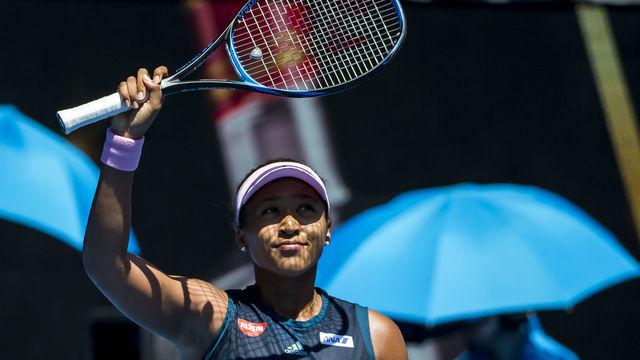 MELBOURNE, AUSTRALIA - JANUARY 23 : Naomi Osaka of Japan celebrates winning the quarterfinals on day 10 of the Australian Open on January 23 2019, at Melbourne Park in Melbourne, Australia.