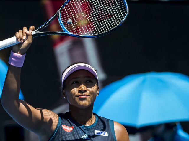 MELBOURNE, AUSTRALIA - JANUARY 23 : Naomi Osaka of Japan celebrates winning the quarterfinals on day 10 of the Australian Open on January 23 2019, at Melbourne Park in Melbourne, Australia.