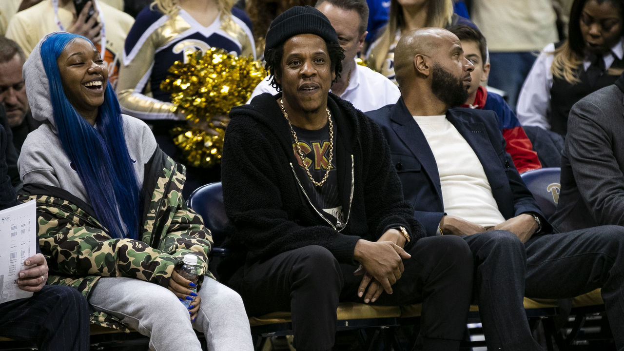 PITTSBURGH, PA -JANUARY 22: Hip Hop artist Jay-Z looks on while sitting court side during the college basketball game between the Duke Blue Devils and the Pittsburgh Panthers on January 22, 2019 at the Petersen Events Center in Pittsburgh, PA.