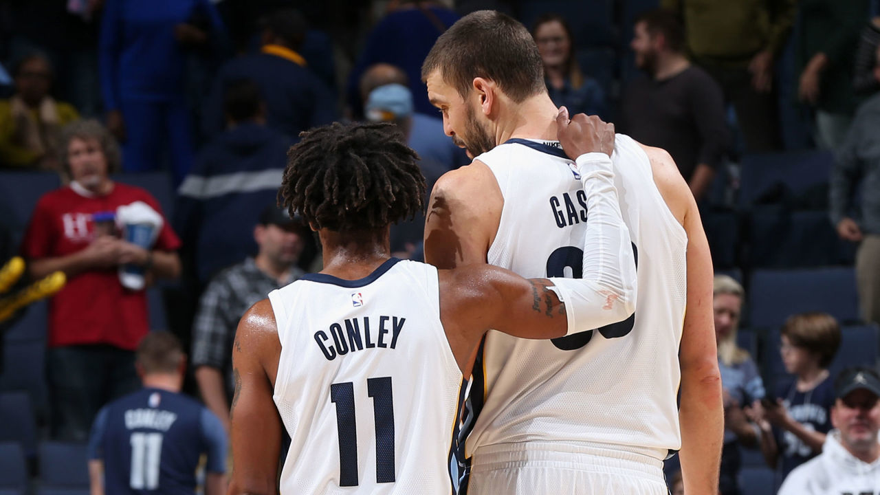MEMPHIS, TN - OCTOBER 26: Mike Conley #11 and Marc Gasol #33 of the Memphis Grizzlies hug after the game against the Dallas Mavericks on October 26, 2017 at FedExForum in Memphis, Tennessee. Mandatory Copyright Notice: Copyright 2017 NBAE
