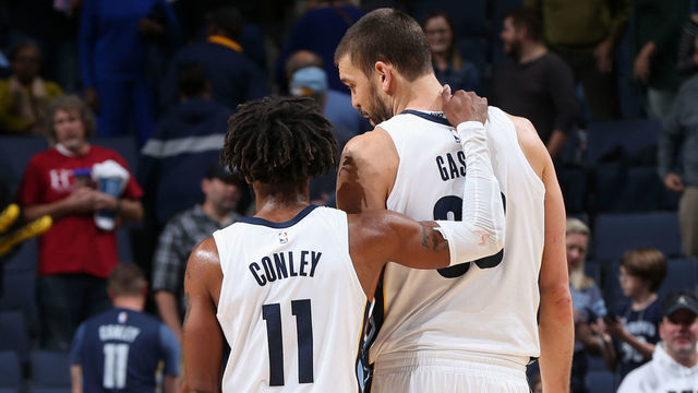 MEMPHIS, TN - OCTOBER 26: Mike Conley #11 and Marc Gasol #33 of the Memphis Grizzlies hug after the game against the Dallas Mavericks on October 26, 2017 at FedExForum in Memphis, Tennessee. Mandatory Copyright Notice: Copyright 2017 NBAE