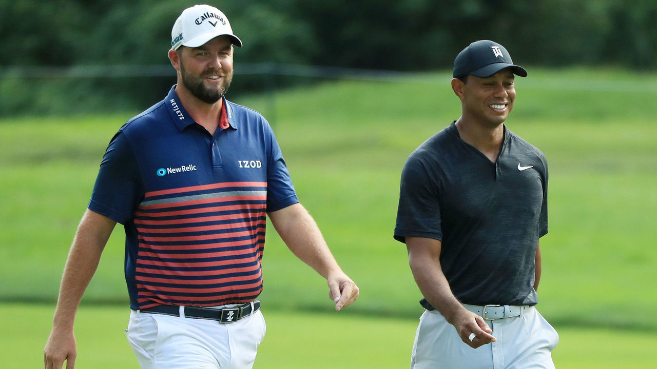 RIDGEWOOD, NJ - AUGUST 24: Marc Leishman of Australia and Tiger Woods of the United States walk on the 18th hole during the second round of The Northern Trust on August 24, 2018 at the Ridgewood Championship Course in Ridgewood, New Jersey.