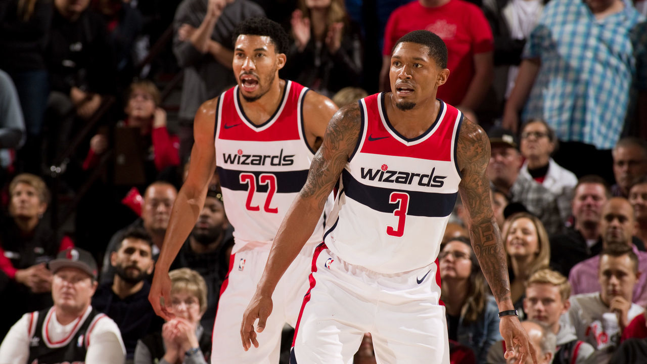 PORTLAND, OR - OCTOBER 22: Otto Porter Jr. #22 and Bradley Beal #3 of the Washington Wizards look on during the game against the Portland Trail Blazers on October 22, 2018 at the Moda Center Arena in Portland, Oregon. Mandatory Copyright Notice: Copyright 2018 NBAE