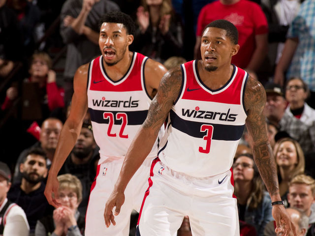 PORTLAND, OR - OCTOBER 22: Otto Porter Jr. #22 and Bradley Beal #3 of the Washington Wizards look on during the game against the Portland Trail Blazers on October 22, 2018 at the Moda Center Arena in Portland, Oregon. Mandatory Copyright Notice: Copyright 2018 NBAE