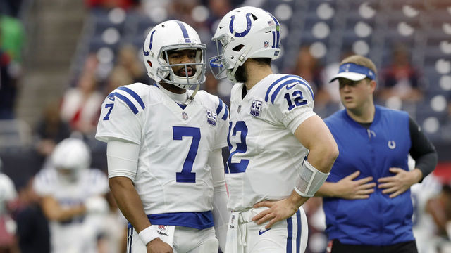 HOUSTON, TX - JANUARY 05: Jacoby Brissett #7 of the Indianapolis Colts talks with Andrew Luck #12 before the game against the Houston Texans during the Wild Card Round at NRG Stadium on January 5, 2019 in Houston, Texas.
