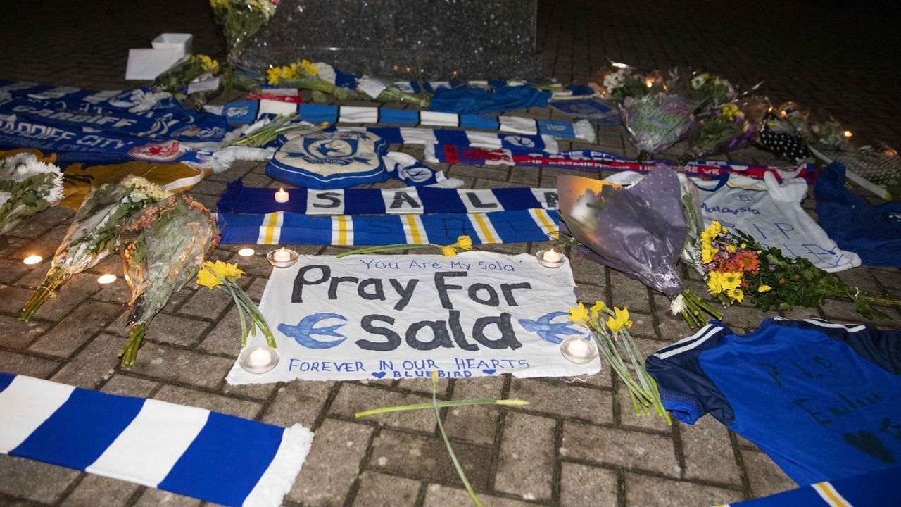 Cardiff fans pay their respects outside Cardiff City Stadium to new record signing Emiliano Sala, after the plane he was travelling on from Nantes to Cardiff went missing over the English Channel, January 22nd 2019. PHOTOGRAPH BY Mark Hawkins / Barcroft Images