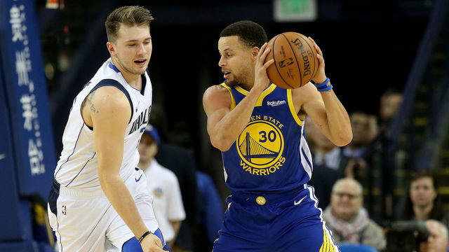 OAKLAND, CA - DECEMBER 22: Golden State Warriors' Stephen Curry #30 is guarded by Dallas Mavericks' Luka Doncic #77 in the first quarter of their NBA game at Oracle Arena in Oakland, Calif., on Saturday, Dec. 22, 2018. (Jane Tyska/Digital First Media/The Mercury News via Getty Images)