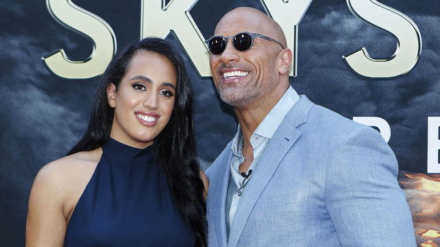 Actor Dwayne Johnson and his daughter Simone Alexandra Johnson attend the premiere of 'Skyscraper' on July 10, 2018 in New York City.