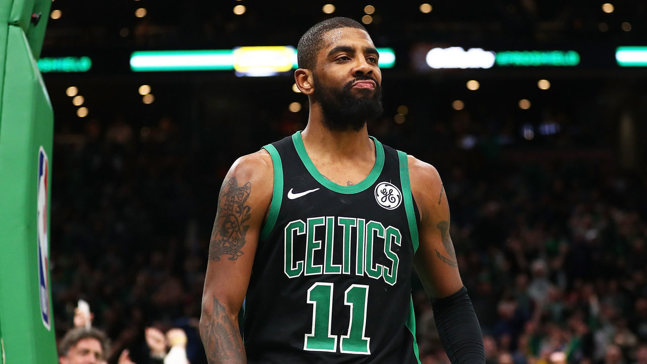 BOSTON, MA - JANUARY 26: Kyrie Irving #11 of the Boston Celtics reacts after being fouled as he made a basket during a game against the Golden State Warriors and at TD Garden on January 26, 2019 in Boston, Massachusetts.