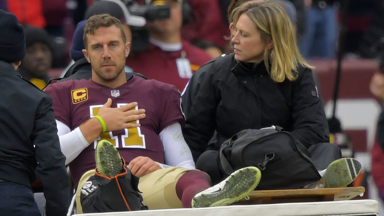 LANDOVER, MD - NOVEMBER 18: Washington Redskins quarterback Alex Smith (11) is carted off the field in the 3rd quarter after breaking his right leg during a game between the Washington Redskins and the Houston Texans at FedEX Field on November 18, 2018, in Landover, MD.