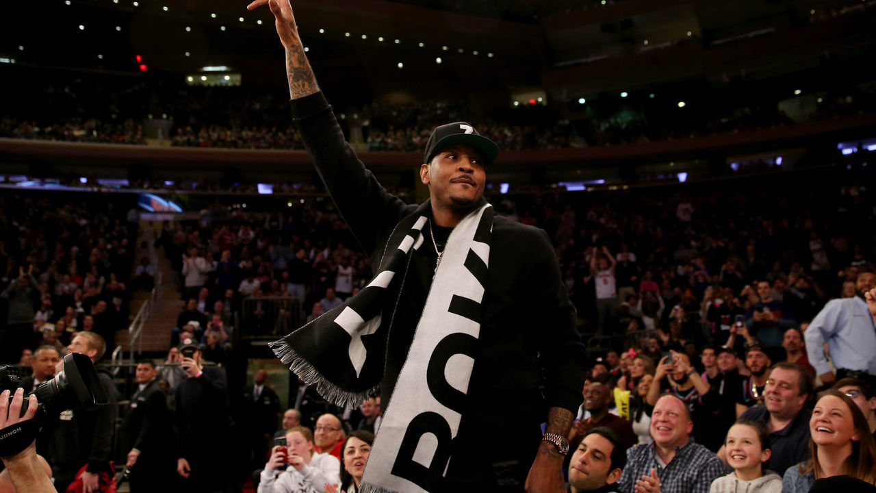NEW YORK, NEW YORK - JANUARY 27: Former New York Knicks player Carmelo Anthony waves to the fans in the first quarter against the Miami Heat at Madison Square Garden on January 27, 2019 in New York City.