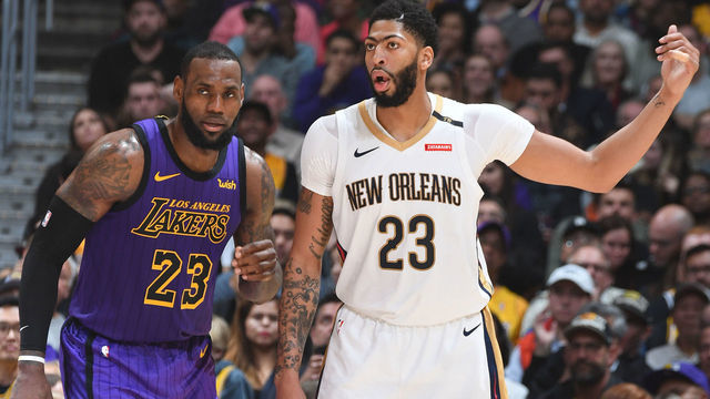 LOS ANGELES, CA - DECEMBER 21: Anthony Davis #23 of the New Orleans Pelicans and LeBron James #23 of the Los Angeles Lakers jock for a position during the game on December 21, 2018 at STAPLES Center in Los Angeles, California. NOTE TO USER: User expressly acknowledges and agrees that, by downloading and/or using this Photograph, user is consenting to the terms and conditions of the Getty Images License Agreement. Mandatory Copyright Notice: Copyright 2018 NBAE