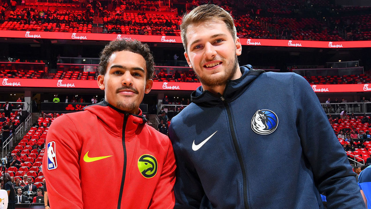 ATLANTA, GA - OCTOBER 24: Trae Young #11 of the Atlanta Hawks and Luka Doncic #77 of the Dallas Mavericks pose for a photo before the game on October 24, 2018 at State Farm Arena in Atlanta, Georgia. NOTE TO USER: User expressly acknowledges and agrees that, by downloading and/or using this photograph, user is consenting to the terms and conditions of the Getty Images License Agreement. Mandatory Copyright Notice: Copyright 2018 NBAE