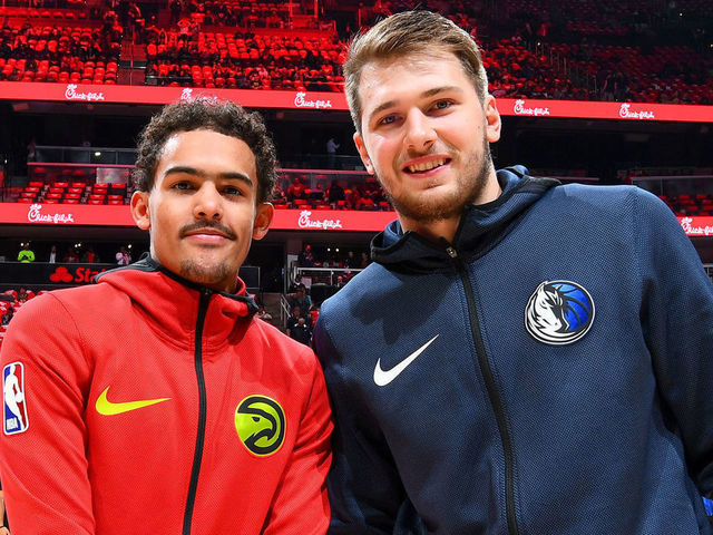 ATLANTA, GA - OCTOBER 24: Trae Young #11 of the Atlanta Hawks and Luka Doncic #77 of the Dallas Mavericks pose for a photo before the game on October 24, 2018 at State Farm Arena in Atlanta, Georgia. NOTE TO USER: User expressly acknowledges and agrees that, by downloading and/or using this photograph, user is consenting to the terms and conditions of the Getty Images License Agreement. Mandatory Copyright Notice: Copyright 2018 NBAE
