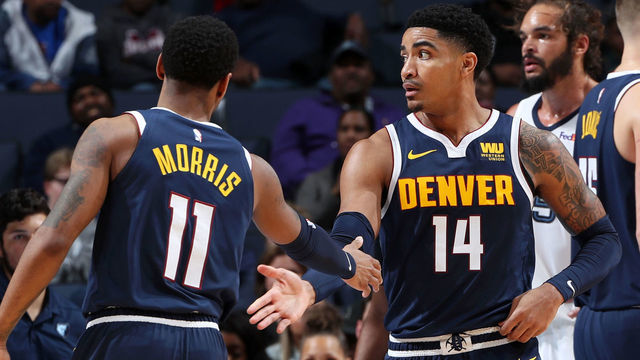 MEMPHIS, TN - JANUARY 28: Monte Morris #11 and Gary Harris #14 of the Denver Nuggets hi-five on January 28, 2019 at FedExForum in Memphis, Tennessee. Mandatory Copyright Notice: Copyright 2019 NBAE