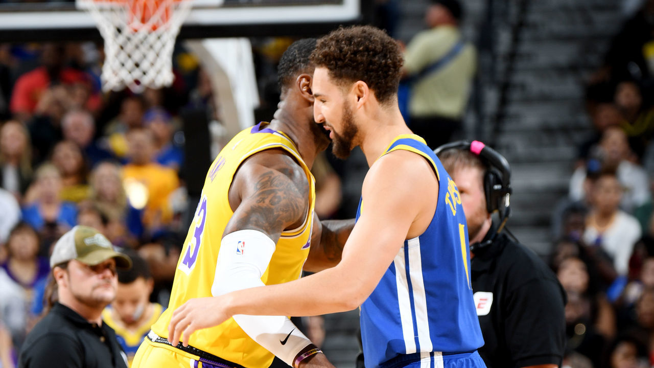 LAS VEGAS, NV- OCTOBER 10: LeBron James #23 of the Los Angeles Lakers and Klay Thompson #11 of the Golden State Warriors share a hug during a pre-season game on October 10, 2018 at T-Mobile Arena in Las Vegas, Nevada. NOTE TO USER: User expressly acknowledges and agrees that, by downloading and/or using this Photograph, user is consenting to the terms and conditions of the Getty Images License Agreement. Mandatory Copyright Notice: Copyright 2018 NBAE