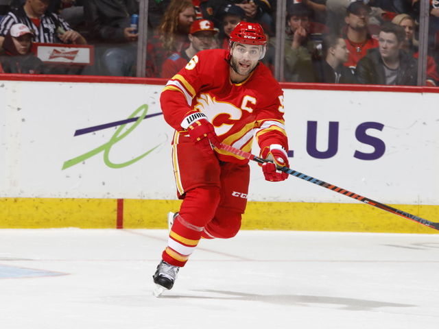 CALGARY, AB - JANUARY 18: Mark Giordano #5 of the Calgary Flames plays against the Detroit Red Wings during an NHL game on January 18, 2019 at the Scotiabank Saddledome in Calgary, Alberta, Canada.