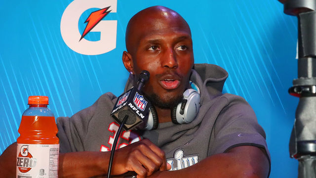 ATLANTA, GA - JANUARY 28: New England Patriots free safety Devin McCourty (32) is interviewed during Super Bowl Opening Night for the New England Patriots on January 28, 2019 at State Farm Arena in Atlanta, GA.