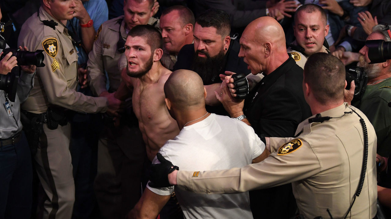 LAS VEGAS, NV - OCTOBER 06: Khabib Nurmagomedov of Russia is involved in a post-fight incident following his defeat of Conor McGregor of Ireland in their UFC lightweight championship bout during the UFC 229 event inside T-Mobile Arena on October 6, 2018 in Las Vegas, Nevada.