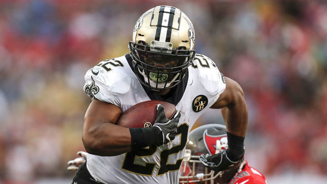 TAMPA, FL - DECEMBER 9: Runningback Mark Ingram, II #22 of the New Orleans Saints runs up the middle to score during the game against the Tampa Bay Buccaneers at Raymond James Stadium on December 9, 2018 in Tampa, Florida. The Saints defeated the Buccaneers 28 to 14 to win the NFC South conference title.