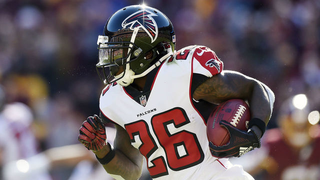 LANDOVER, MD - NOVEMBER 04: Running back Tevin Coleman #26 of the Atlanta Falcons runs with the ball in the first quarter against the Washington Redskins at FedExField on November 4, 2018 in Landover, Maryland.