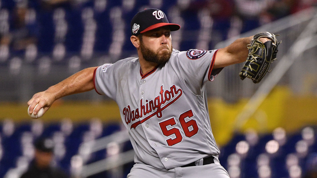 MIAMI, FL - SEPTEMBER 18: Greg Holland #56 of the Washington Nationals pitches against the Miami Marlins at Marlins Park on September 18, 2018 in Miami, Florida.