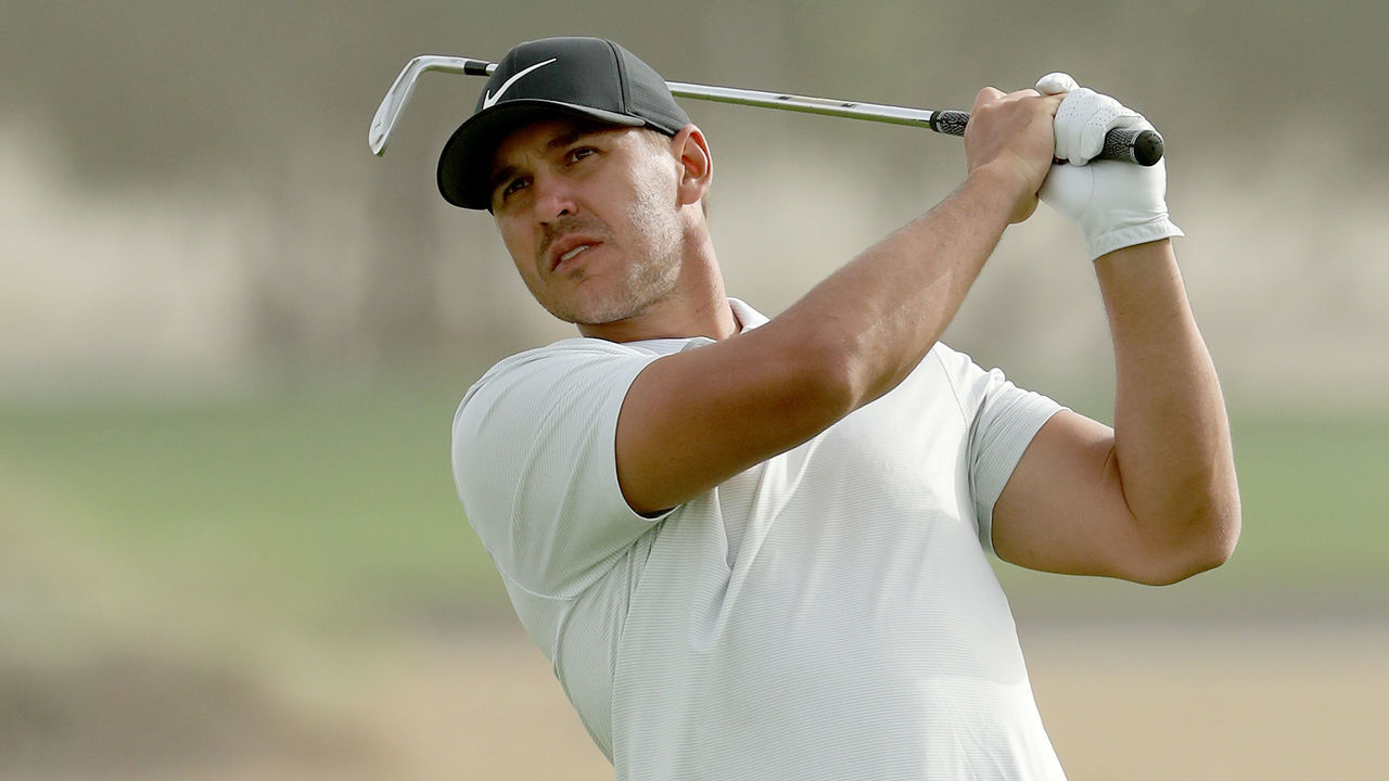 ABU DHABI, UNITED ARAB EMIRATES - JANUARY 19: Brooks Koepka of the United States plays his second shot on the par 4, 17th hole during the final round of the Abu Dhabi HSBC Golf Championship at the Abu Dhabi Golf Club on January 19, 2019 in Abu Dhabi, United Arab Emirates.