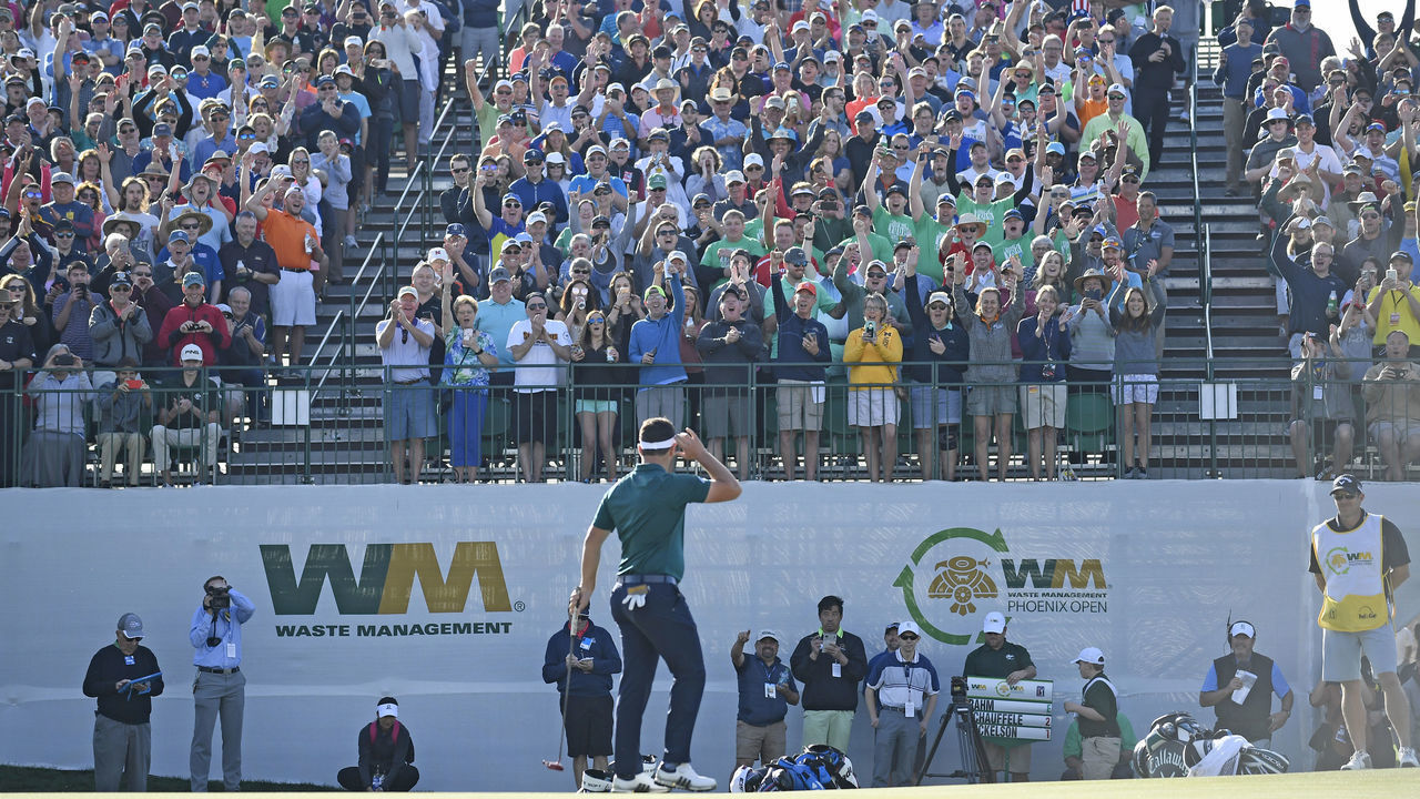 SCOTTSDALE, AZ - FEBRUARY 01: Jon Rahm of Spain makes a birdie on the 16th hole during the first round of the Waste Management Phoenix Open at TPC Scottsdale on February 1, 2018 in Scottsdale, Arizona.