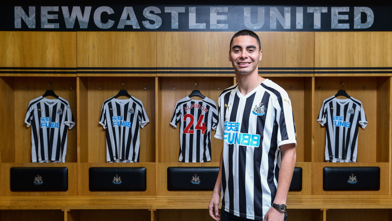 NEWCASTLE UPON TYNE, ENGLAND - JANUARY 30: New signing Miguel Almiron poses for photos in the home dressing room at St.James' Park on January 30, 2019 in Newcastle upon Tyne, England.