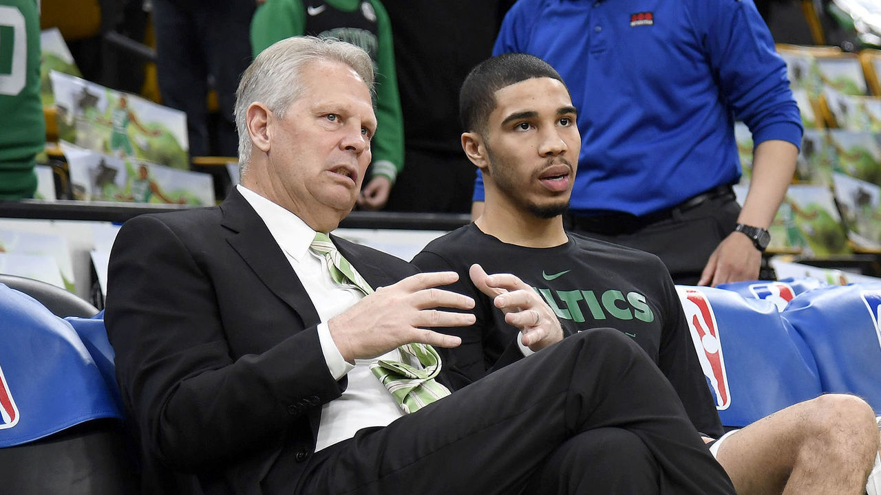 BOSTON, MA - JANUARY 4: General Manager Danny Ainge and Jayson Tatum #0 of the Boston Celtics talk before the game against the Dallas Mavericks on January 4, 2019 at the TD Garden in Boston, Massachusetts. NOTE TO USER: User expressly acknowledges and agrees that, by downloading and/or using this photograph, user is consenting to the terms and conditions of the Getty Images License Agreement. Mandatory Copyright Notice: Copyright 2019 NBAE