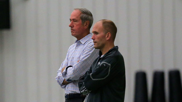 OWINGS MILLS, MD - SEPTEMBER 08: Baltimore Ravens President Dick Cass (L) and assistant general manager Eric DeCosta (R) watch the team practice at their training facility on September 8, 2014 in Owings Mills, Maryland. Earlier in the day the Ravens terminated the contract of running back Ray Rice and the NFL suspended him indefinitely after the release of video showing Rice striking his then-fiancée in a hotel elevator.