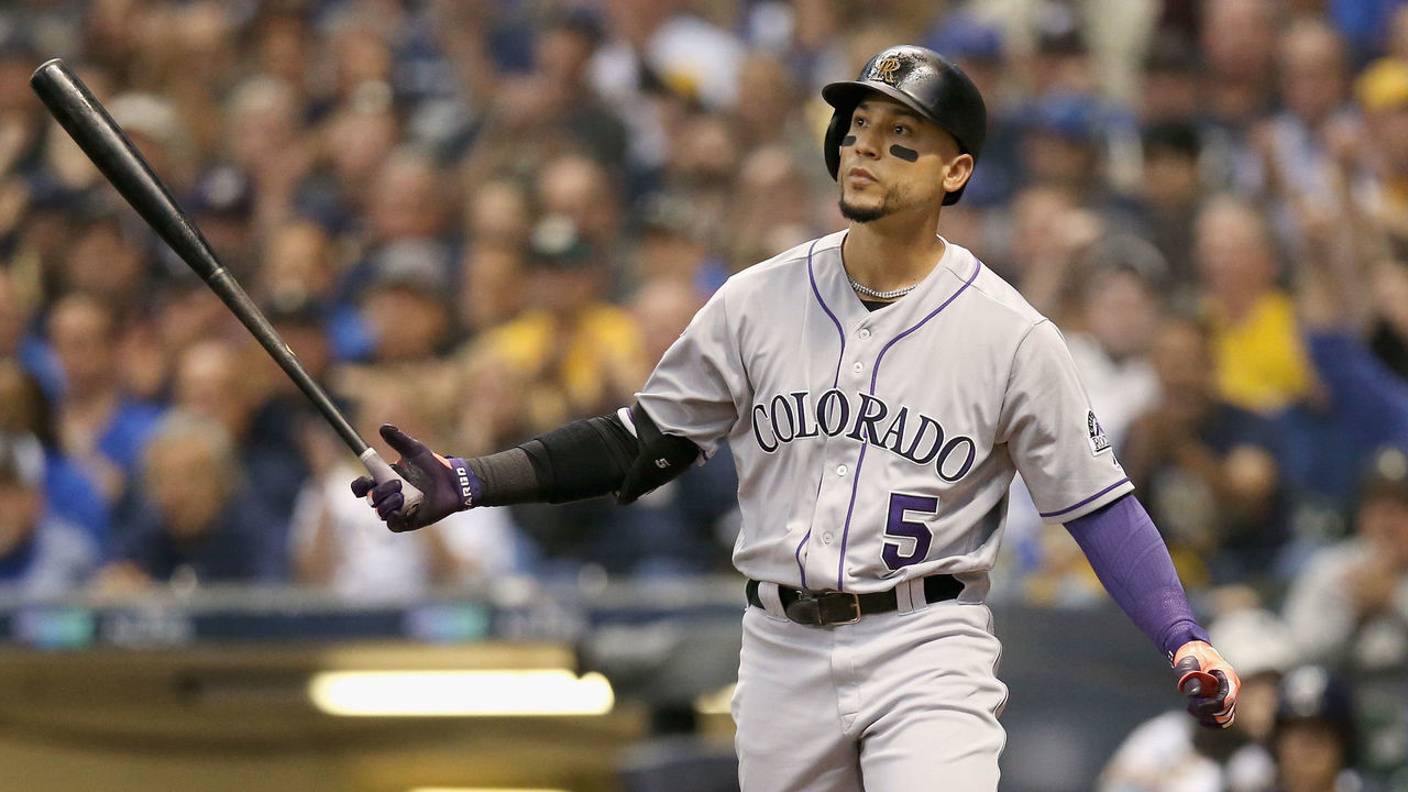 MILWAUKEE, WI - OCTOBER 05: Carlos Gonzalez #5 of the Colorado Rockies reacts after striking out during the sixth inning of Game Two of the National League Division Series against the Milwaukee Brewers at Miller Park on October 5, 2018 in Milwaukee, Wisconsin.