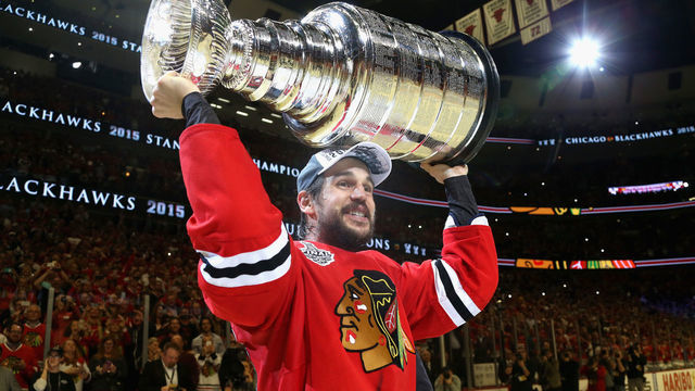 CHICAGO, IL - JUNE 15: Antoine Vermette #80 of the Chicago Blackhawks hoists the Stanley Cup in celebration after his team defeated the Tampa Bay Lightning 2-0 in Game Six of the 2015 NHL Stanley Cup Final at the United Center on June 15, 2015 in Chicago, Illinois.
