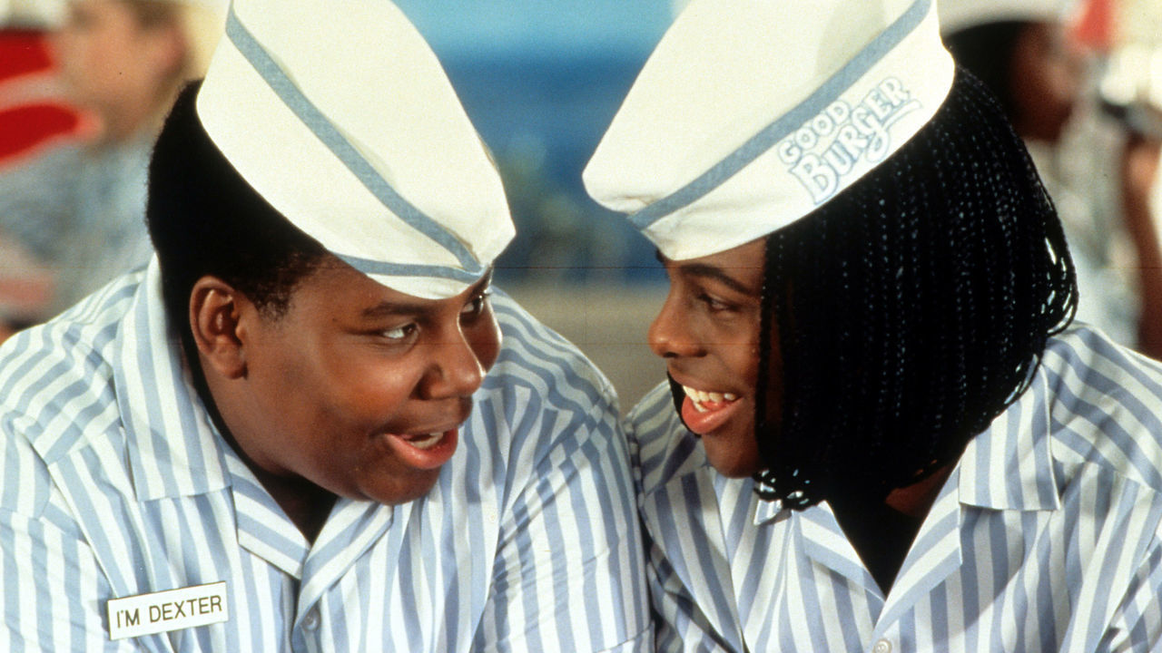 Kenan Thompson and Kel Mitchell smiling in a scene from the film 'Good Burger', 1997.