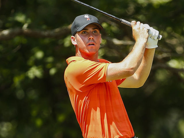 STILLWATER, OK - MAY 30: Matthew Wolff of Oklahoma State tees off while Davis Riley watches on during the Division I Men's Golf Team Match Play Championship held at the Karsten Creek Golf Club on May 30, 2018 in Stillwater, Oklahoma.