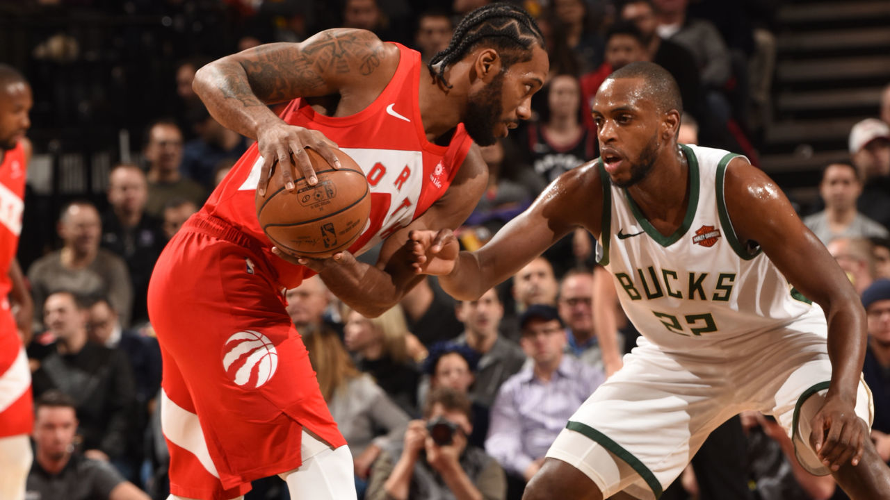 TORONTO, CANADA - JANUARY 31: Kawhi Leonard #2 of the Toronto Raptors handles the ball against Khris Middleton #22 of the Milwaukee Bucks on January 31, 2019 at the Scotiabank Arena in Toronto, Ontario, Canada. Mandatory Copyright Notice: Copyright 2019 NBAE