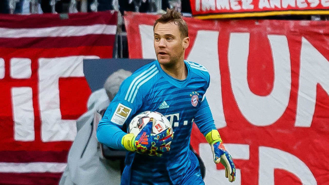 MUNICH, GERMANY - JANUARY 27: goalkeeper Manuel Neuer of Bayern Muenchen controls the ball during the Bundesliga match between FC Bayern Muenchen and VfB Stuttgart at Allianz Arena on January 27, 2019 in Munich, Germany.