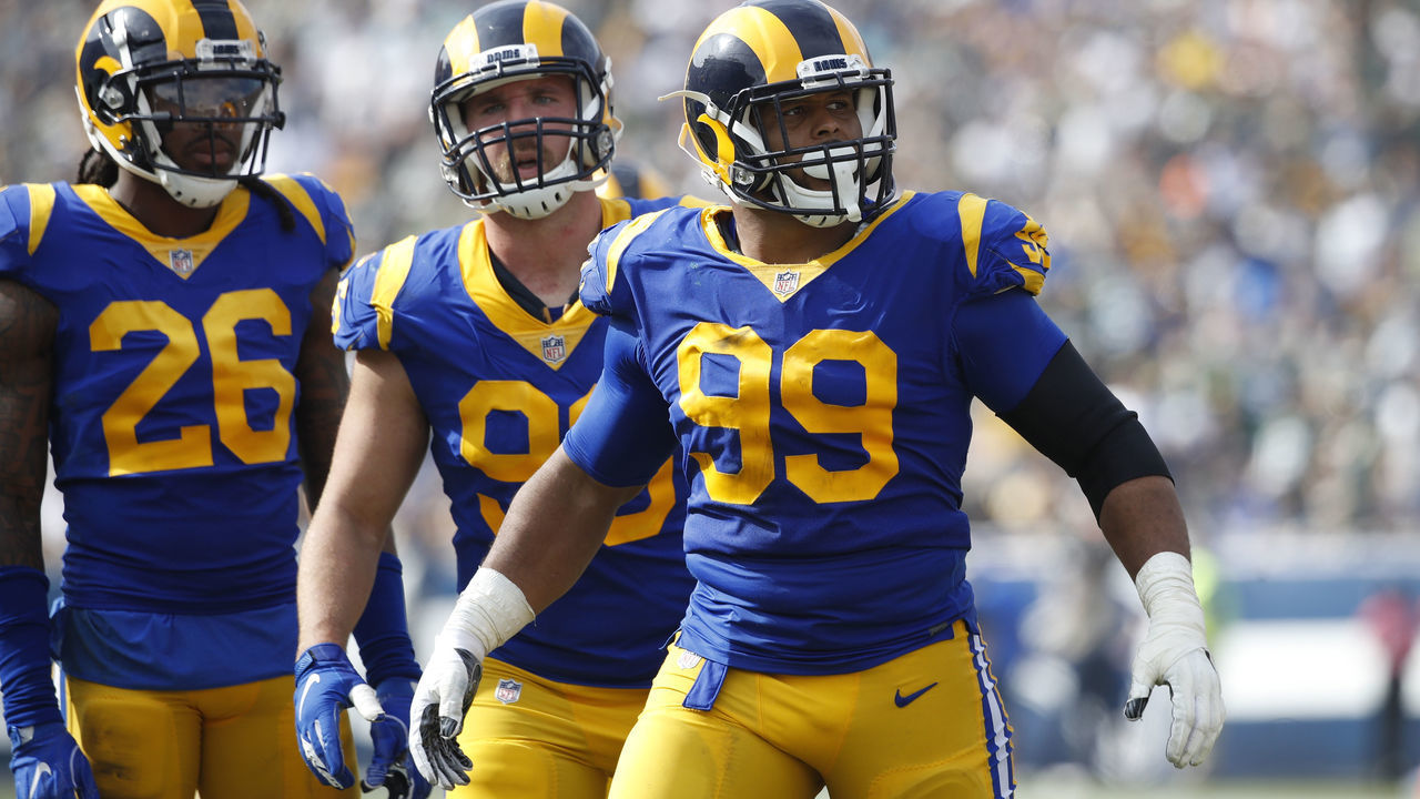 LOS ANGELES, CA - OCTOBER 28: Aaron Donald #99 of the Los Angeles Rams reacts during the game against the Green Bay Packers at Los Angeles Memorial Coliseum on October 28, 2018 in Los Angeles, California. The Rams won 29-27.