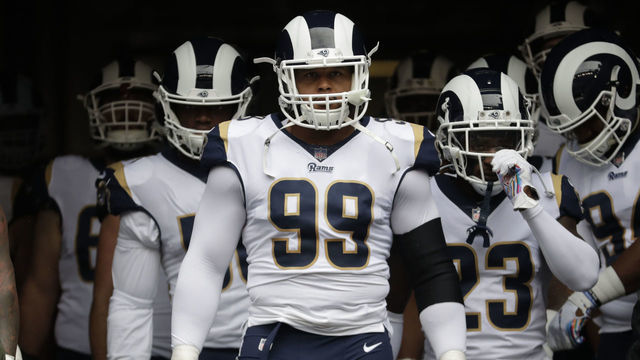 SEATTLE, WA - OCTOBER 07: Defensive lineman Aaron Donald #99 of the Los Angeles Rams waits to take the field with teammates before a game against the Seattle Seahawks at CenturyLink Field on October 7, 2018 in Seattle, Washington. The Rams won the game 33-31.