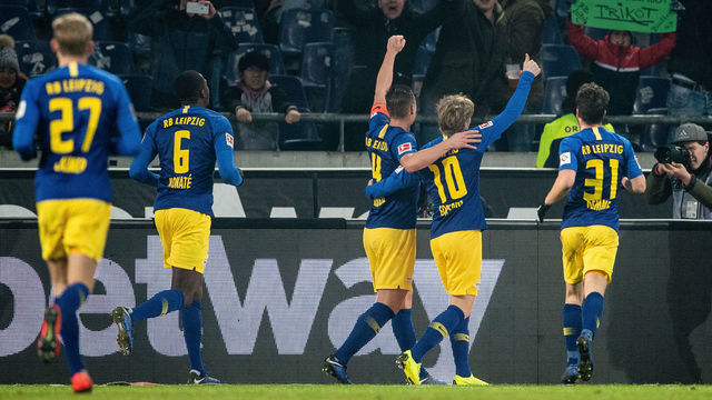 01 February 2019, Lower Saxony, Hannover: Soccer: Bundesliga, Hannover 96 - RB Leipzig, 20th matchday in the HDI-Arena. Leipzig's players cheer after the 0:3 by Leipzig's Willi Orban (M). Photo: Swen Pförtner/dpa - IMPORTANT NOTE: In accordance with the requirements of the DFL Deutsche Fußball Liga or the DFB Deutscher Fußball-Bund, it is prohibited to use or have used photographs taken in the stadium and/or the match in the form of sequence images and/or video-like photo sequences.