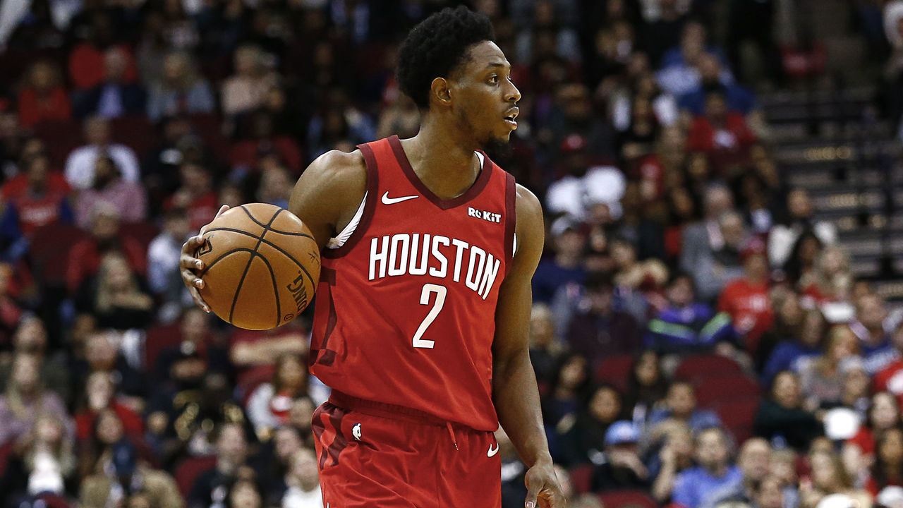 HOUSTON, TEXAS - DECEMBER 31: Brandon Knight #2 of the Houston Rockets brings the ball up the court against the Memphis Grizzlies at Toyota Center on December 31, 2018 in Houston, Texas.