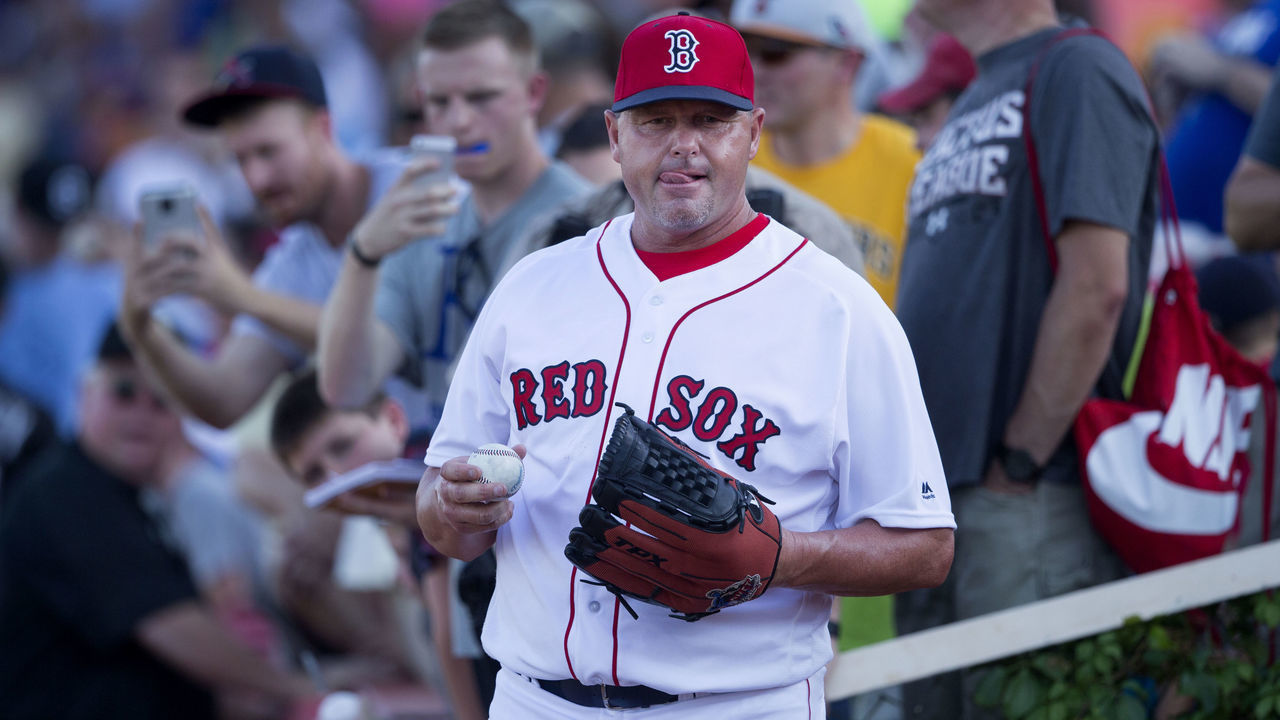 WICHITA, KS - AUGUST 10: On a day when the heat index reached 100 degrees, Roger Clemens, wearing his Red Sox jersey and cap, warms up for the Kansas Stars, a team made up of almost all retired major leaguers, before playing in the NBC World Series against amateurs at Lawrence-Dumont Stadium in Wichita, Kansas, Aug. 10, 2016.