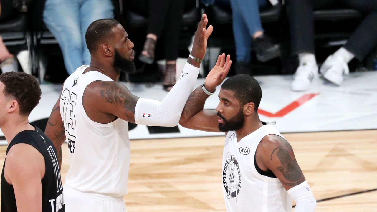 LOS ANGELES, CA - FEBRUARY 18: LeBron James #23 and Kyrie Irving #11 of Team LeBron high five during the game against Team Stephen during the NBA All-Star Game as a part of 2018 NBA All-Star Weekend at STAPLES Center on February 18, 2018 in Los Angeles, California. NOTE TO USER: User expressly acknowledges and agrees that, by downloading and/or using this photograph, user is consenting to the terms and conditions of the Getty Images License Agreement. Mandatory Copyright Notice: Copyright 2018 NBAE