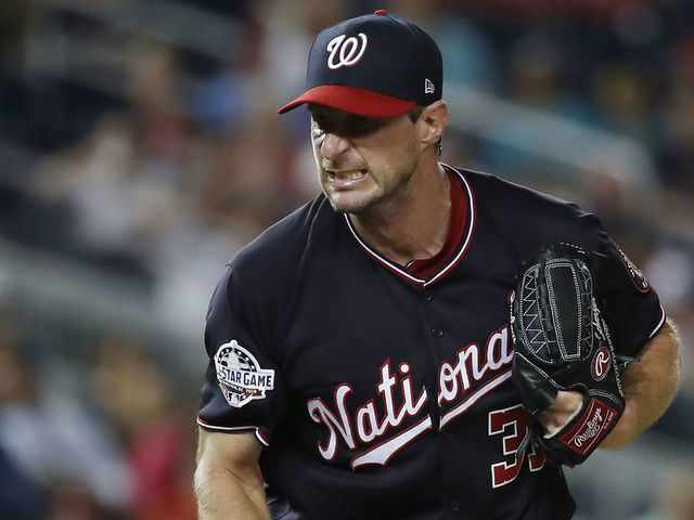 WASHINGTON, DC - AUGUST 07: Max Scherzer #31 of the Washington Nationals reacts after striking out Dansby Swanson #7 of the Atlanta Braves (not pictured) in the seventh inning during game two of a doubleheader at Nationals Park on August 7, 2018 in Washington, DC.