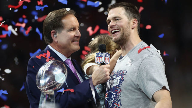 ATLANTA, GA - FEBRUARY 03: Jim Nantz (L) interviews Tom Brady #12 of the New England Patriots after the Patriots defeat the Los Angeles Rams 13-3 during Super Bowl LIII at Mercedes-Benz Stadium on February 3, 2019 in Atlanta, Georgia.