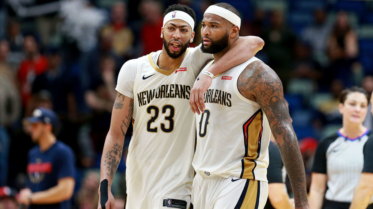 NEW ORLEANS, LA - JANUARY 22: Anthony Davis #23 of the New Orleans Pelicans and DeMarcus Cousins #0 of the New Orleans Pelicans walk of the court during a NBA game against the Chicago Bulls at the Smoothie King Center on January 22, 2018 in New Orleans, Louisiana.