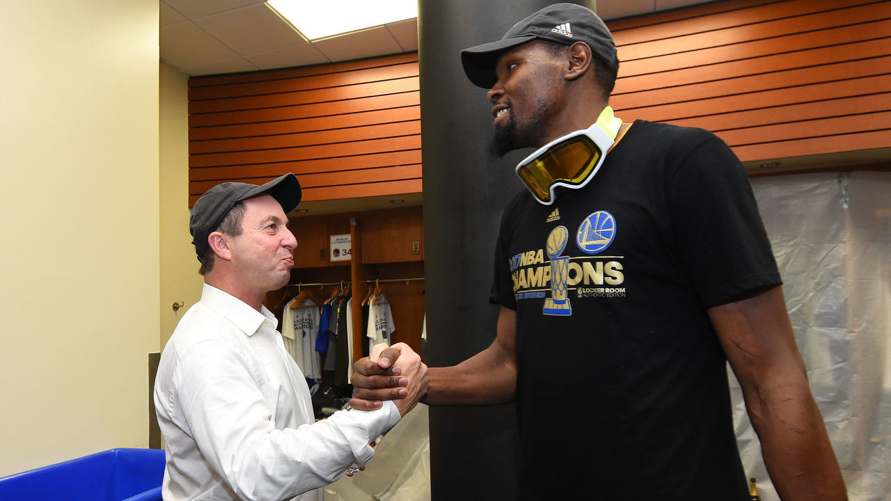OAKLAND, CA - JUNE 12: Joe Lacob and Kevin Durant #35 of the Golden State Warriors after winning the NBA Championshiop against the Cleveland Cavaliers in Game Five of the 2017 NBA Finals on June 12, 2017 at ORACLE Arena in Oakland, California. NOTE TO USER: User expressly acknowledges and agrees that, by downloading and/or using this photograph, user is consenting to the terms and conditions of Getty Images License Agreement. Mandatory Copyright Notice: Copyright 2017 NBAE