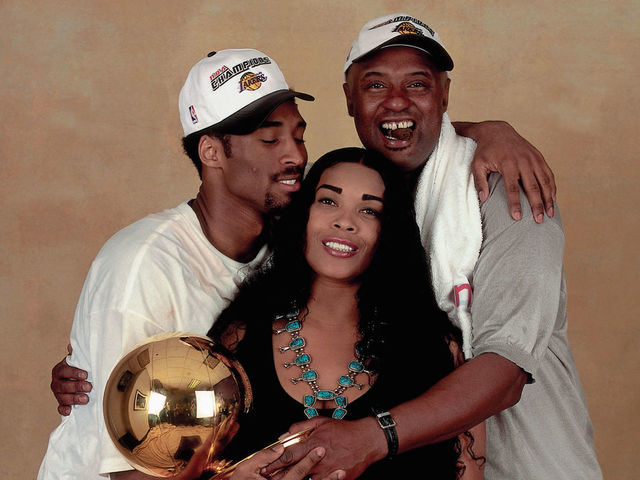 LOS ANGELES - JUNE 19: Kobe Bryant #8 of the Los Angeles Lakers poses for a photo with his parents after winning the NBA Championship on June 19, 2000 at the Staples Center in Los Angeles, California. NOTE TO USER: User expressly acknowledges that, by downloading and or using this photograph, User is consenting to the terms and conditions of the Getty Images License agreement. Mandatory Copyright Notice: Copyright 2000 NBAE