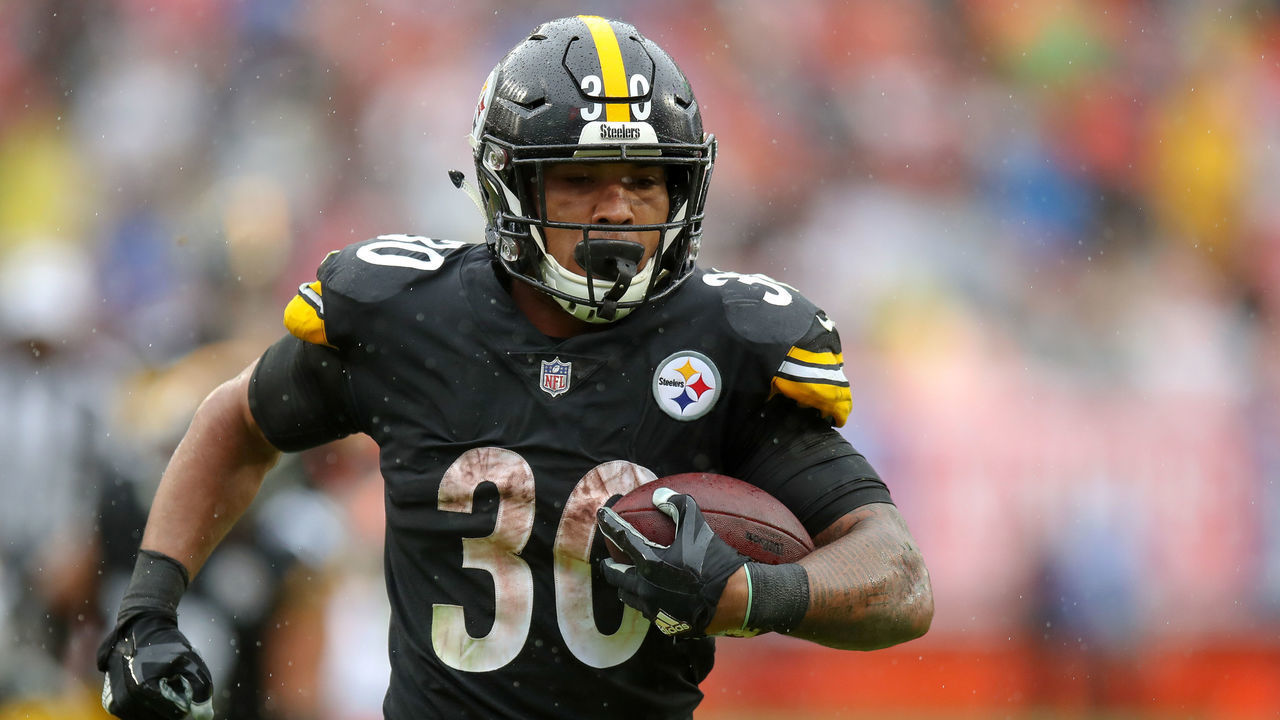 CLEVELAND, OH - SEPTEMBER 09: Pittsburgh Steelers running back James Conner (30) scores on a 22 yard touchdown run during the third quarter of the National Football League game between the Pittsburgh Steelers and Cleveland Browns on September 9, 2018, at FirstEnergy Stadium in Cleveland, OH. Pittsburgh and Cleveland tied 21-21.