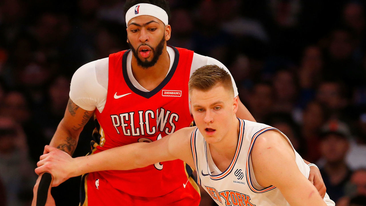 NEW YORK, NY - JANUARY 14: (NEW YORK DAILIES OUT) Kristaps Porzingis #6 of the New York Knicks in action against Anthony Davis #23 of the New Orleans Pelicans at Madison Square Garden on January 14, 2018 in New York City. The Pelicans defeated the Knicks 123-118 in overtime. NOTE TO USER: User expressly acknowledges and agrees that, by downloading and/or using this Photograph, user is consenting to the terms and conditions of the Getty Images License Agreement.